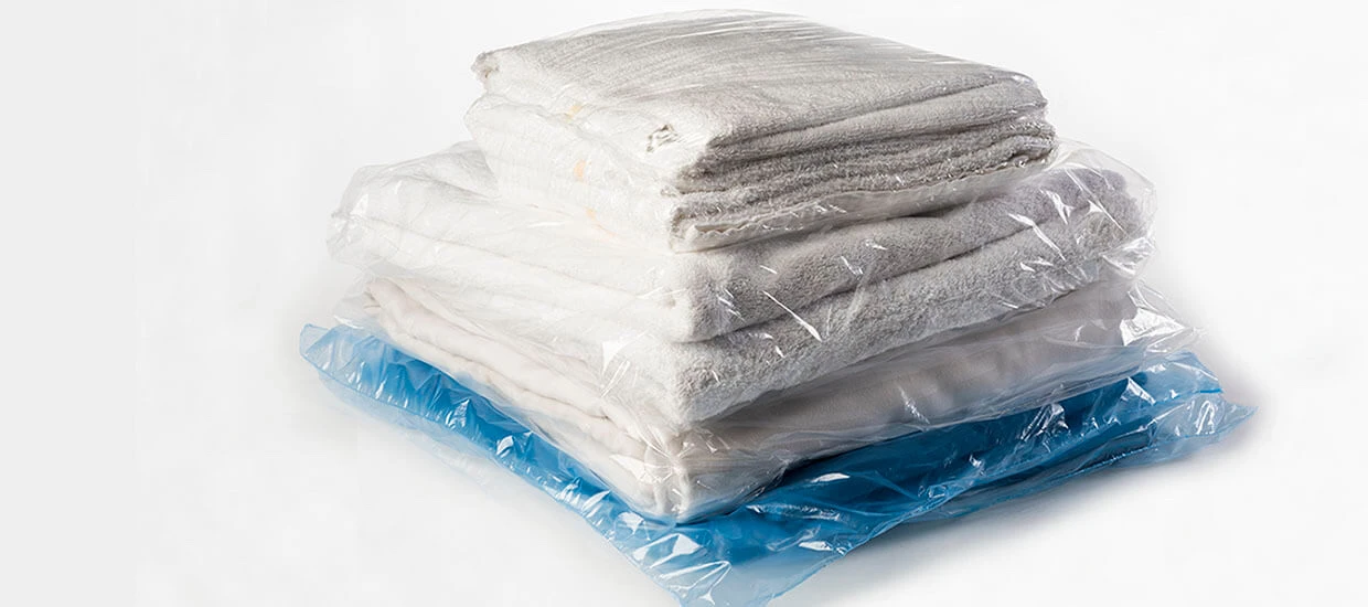 Shrink wrapped laundry - bundle of freshly laundered towels