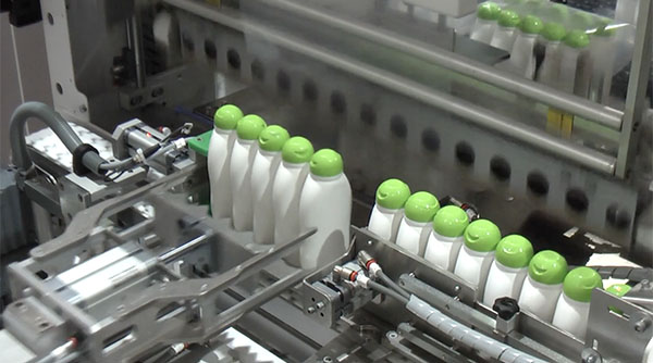 Video demonstration of shrink wrapping plastic bottles