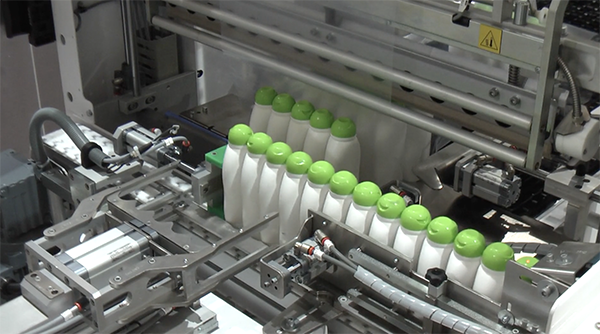 Video demonstration of shrink wrapping plastic bottles