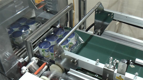 Automatic L Sealer video demonstrating the wrapping process for trays of tea products
