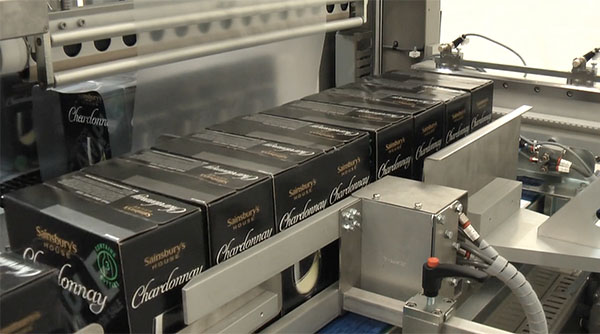 video of our automatic sleeve wrapper shrink wrapping wine boxes for transportation and presentation purposes.