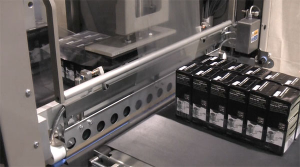 Automatic Sleeve Wrapper video - wrapping tea cartons