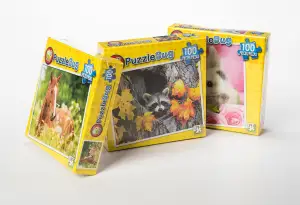 Shrink wrap packaging for games and puzzle boxes Shrink wrap packaging for games and puzzle boxes
